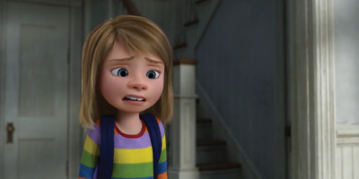 This is Riley Andersen. This is when all her emotions are still there, and so even though the moving was bad, she was still happy. Well not in this picture. Also notice how her sweater has all the emotions' colors? (Ảnh: Disney Wikia)